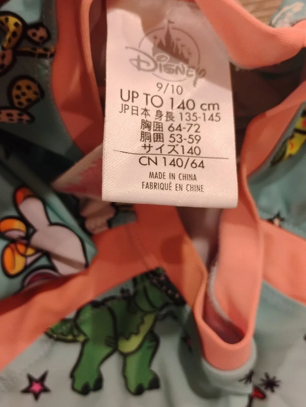Disney Girls Toy Story Novelty Print Long Sleeve Cutout Side Rashguard Top 9/10